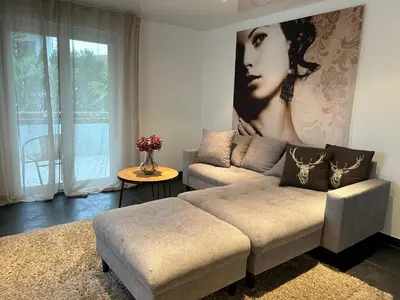 Ein Sitzbereich in der Unterkunft Alex Design Appartment