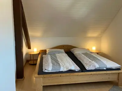 Ein Bett oder Betten in einem Zimmer der Unterkunft Stocksberg 1881 Apartments