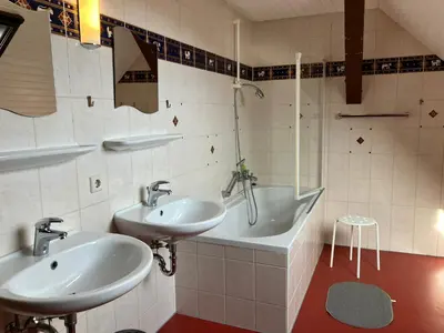 Ein Badezimmer in der Unterkunft Stocksberg 1881 Apartments