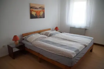Ein Bett oder Betten in einem Zimmer der Unterkunft Stocksberg 1881 Apartments
