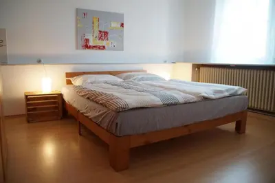 Ein Bett oder Betten in einem Zimmer der Unterkunft Stocksberg 1881 Apartments