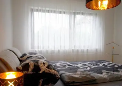 Ein Bett oder Betten in einem Zimmer der Unterkunft Best in Town