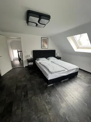Ein Bett oder Betten in einem Zimmer der Unterkunft Gemütlich wohnen Sinsheim