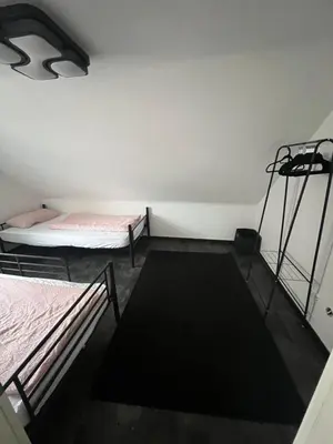 Ein Bett oder Betten in einem Zimmer der Unterkunft Gemütlich wohnen Sinsheim