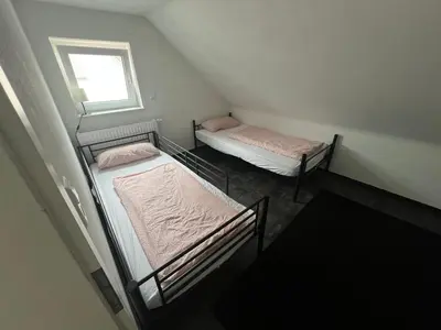 Ein Bett oder Betten in einem Zimmer der Unterkunft Gemütlich wohnen Sinsheim