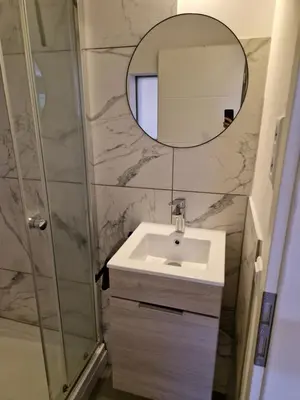 Ein Badezimmer in der Unterkunft Green Hill Apartment
