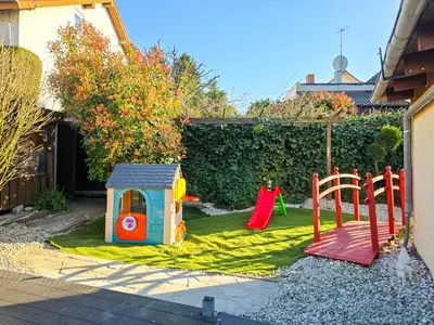 Ein Kinderspielbereich in der Unterkunft STAR-Apartment - Garden with Terrace, Calm, 120m2