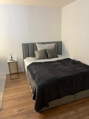 Ein Bett oder Betten in einem Zimmer der Unterkunft City Appartement direkt am Schloss!