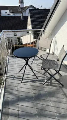 Ein Balkon oder eine Terrasse in der Unterkunft Charmantes Studio-Apartment im Herzen von Neureut - Fußbodenheizung, Regendusche, Waschmaschine, Stellplatz