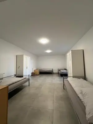 Ein Bett oder Betten in einem Zimmer der Unterkunft Mieterlux Frankfurt Heusenstamm