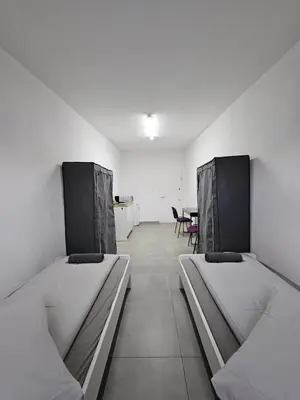 Ein Bett oder Betten in einem Zimmer der Unterkunft Mieterlux Frankfurt Heusenstamm