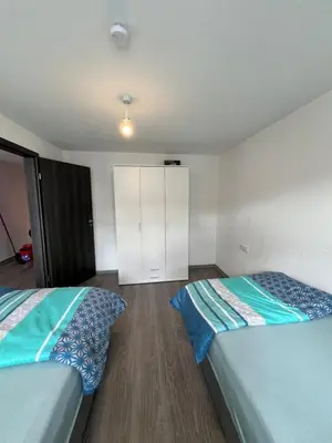 Ein Bett oder Betten in einem Zimmer der Unterkunft City Unterkunft 5