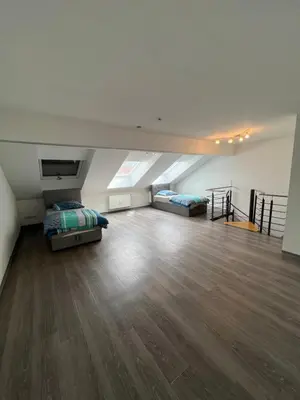 Ein Bett oder Betten in einem Zimmer der Unterkunft City Unterkunft 5
