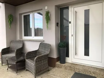 Ein Sitzbereich in der Unterkunft Einliegerwohnung in Gissigheim