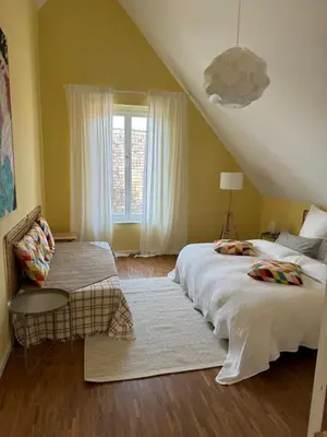 Ein Bett oder Betten in einem Zimmer der Unterkunft Wohnen am Seebach II