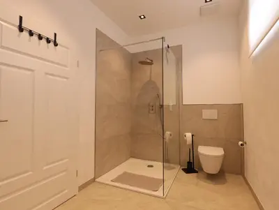 Ein Badezimmer in der Unterkunft Zum Tausendsassa