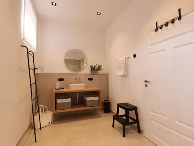Ein Badezimmer in der Unterkunft Zum Tausendsassa