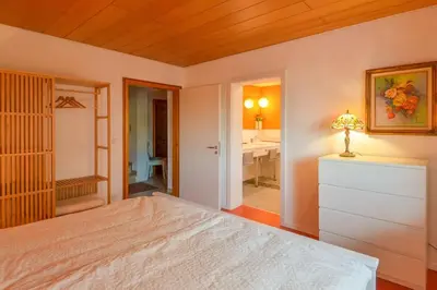 Ein Bett oder Betten in einem Zimmer der Unterkunft Unter den Reben