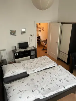 Ein Bett oder Betten in einem Zimmer der Unterkunft Holländers Apartment