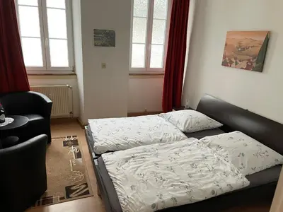 Ein Bett oder Betten in einem Zimmer der Unterkunft Holländers Apartment