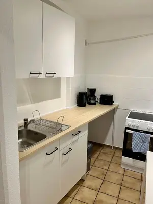 Küche/Küchenzeile in der Unterkunft L5 Apartments - Ganze Wohnung, Küche, Bad, WLAN, Terrasse
