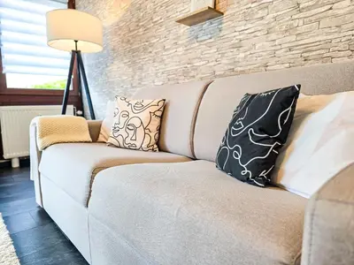 Ein Sitzbereich in der Unterkunft COSY-Apartment - Glazed Balkony & Carport, 70m2