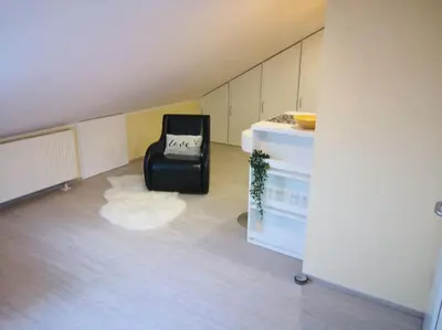Ein Sitzbereich in der Unterkunft Über den Dächern von Mörfelden-Walldorf