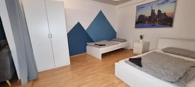 Ein Bett oder Betten in einem Zimmer der Unterkunft Private Wohnung in Leimen
