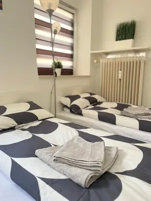 Ein Bett oder Betten in einem Zimmer der Unterkunft LENASTAY I Nette Unterkunft I Günstige Lage