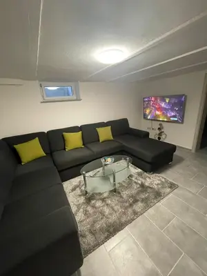 Ein Sitzbereich in der Unterkunft gemütliches und Schönes Zimmer Keller Geschoss K1