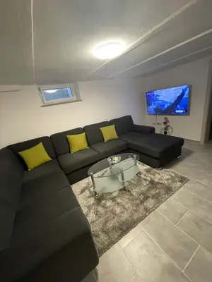 Ein Sitzbereich in der Unterkunft gemütliches und Schönes Zimmer Keller Geschoss K1