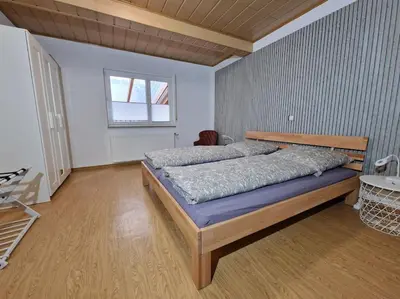 Ein Bett oder Betten in einem Zimmer der Unterkunft Schöne große Wohnung 2 Schlafzimmer Max 5 Personen