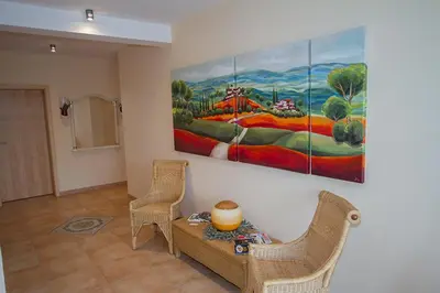 Ein Sitzbereich in der Unterkunft Villa Toskana