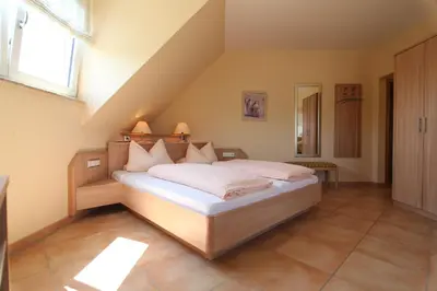 Ein Bett oder Betten in einem Zimmer der Unterkunft Villa Toskana