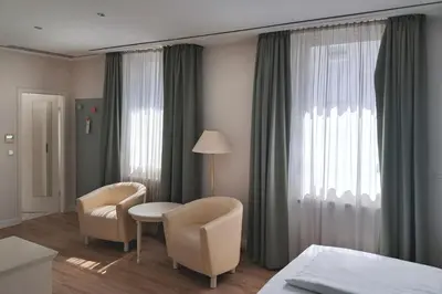 Ein Bett oder Betten in einem Zimmer der Unterkunft Garner Hotel Post Aschaffenburg by IHG