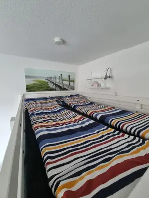 Ein Bett oder Betten in einem Zimmer der Unterkunft Ruhig & Mitten in der Altstadt, nahe Uni&Schloss