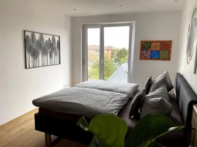 Ein Bett oder Betten in einem Zimmer der Unterkunft Modernes City-Apartment