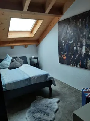 Ein Bett oder Betten in einem Zimmer der Unterkunft FeWoHerrmann