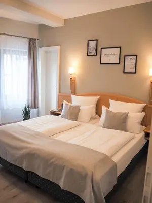 Ein Bett oder Betten in einem Zimmer der Unterkunft Weinstraße No 8 