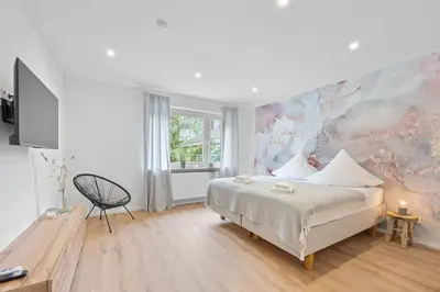 Ein Bett oder Betten in einem Zimmer der Unterkunft Casa Aguila - Viernheim