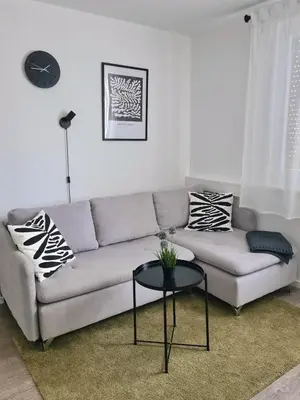 Ein Sitzbereich in der Unterkunft Modernes zentrales Apartment