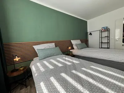 Ein Bett oder Betten in einem Zimmer der Unterkunft Business- Apartment Worms # guesthouse- Monteure willkommen