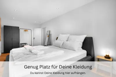 Ein Bett oder Betten in einem Zimmer der Unterkunft Urban Jungle Industríal Parkplatz Balkon Business