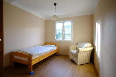 Ein Bett oder Betten in einem Zimmer der Unterkunft Ferienwohnung Dürr