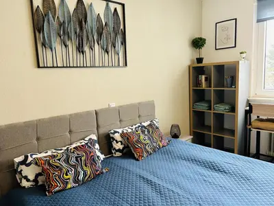 Ein Bett oder Betten in einem Zimmer der Unterkunft LENASTAY I Modernes Apartment-Studio near Uni