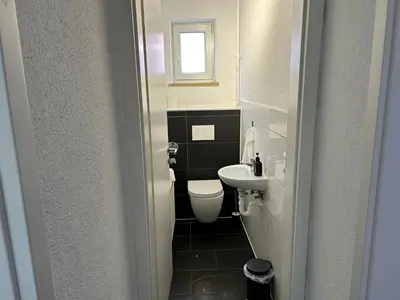 Ein Badezimmer in der Unterkunft Zentrale 3Zimmer Wohnung mit Stellplatz