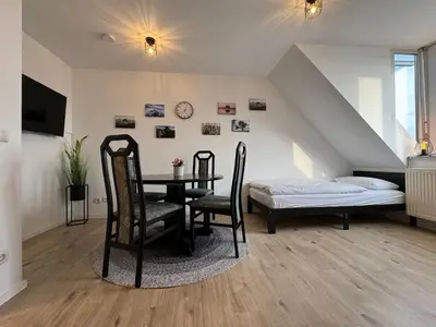 Ein Bett oder Betten in einem Zimmer der Unterkunft Gemütliches Apartment für 2 Personen nahe RaumFabrik - Durlach by Rabe