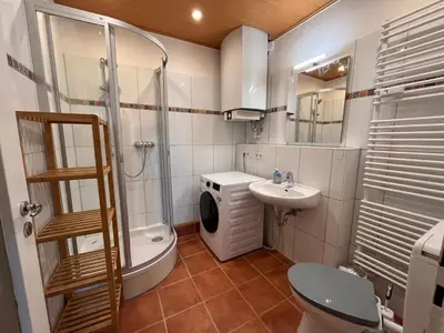 Ein Badezimmer in der Unterkunft Bohlen-Mühle - Monteurzimmer Reuhl