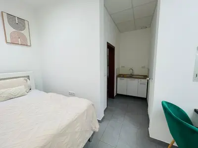 Ein Bett oder Betten in einem Zimmer der Unterkunft Sonnenblume Residenz