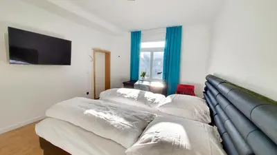 Ein Bett oder Betten in einem Zimmer der Unterkunft Premium Studio in zentraler Lage Mannheims